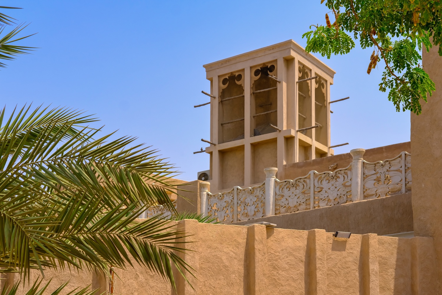 Traditional Arabic house with wind catcher tower or Barjeel for cross ventilation