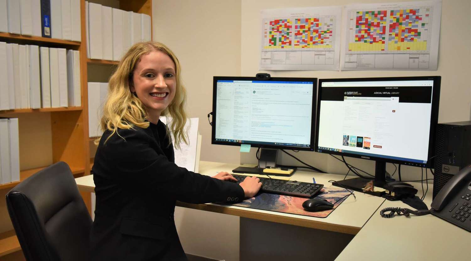 Jahna Cafe in her office smiling