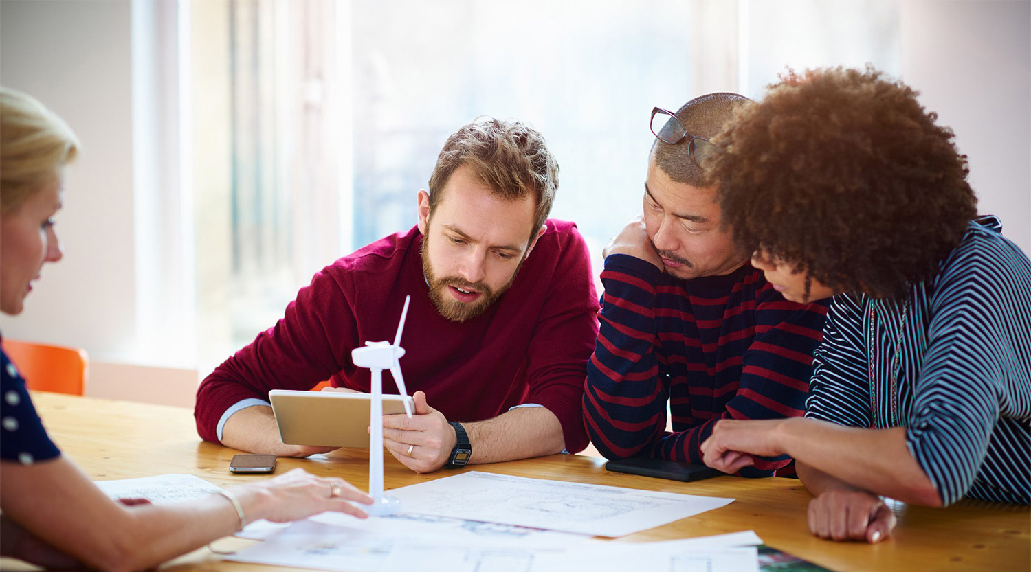 Group of coworkers discussing project