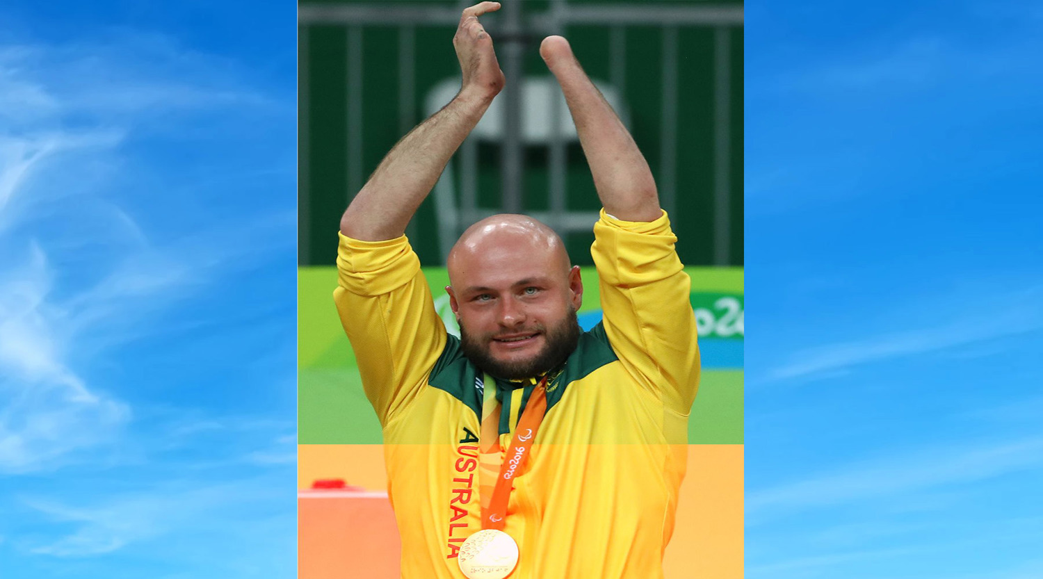 Chris Bond celebrates with Men's Wheelchair Rugby Gold Medal at Rio 2016 Paralympic Games