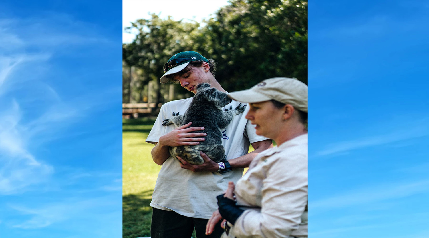 Thomas Keating holds Koala at Australia Zoo